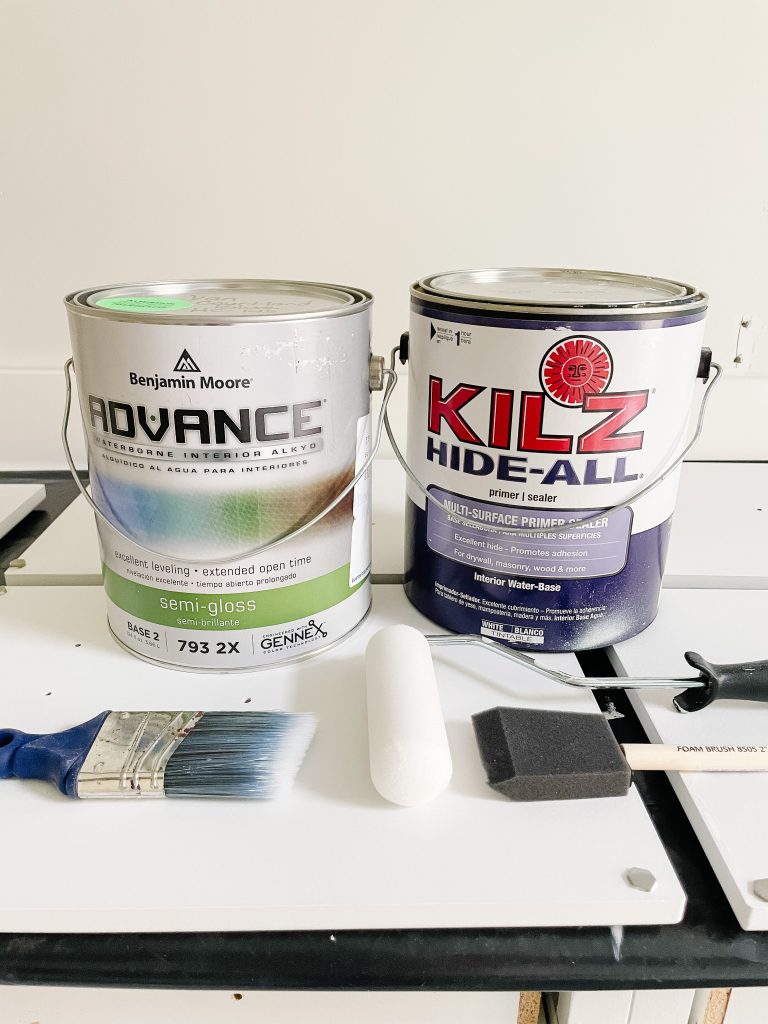 Cans of paint for thermofoil cabinets