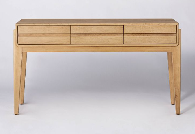light wood table with drawers
