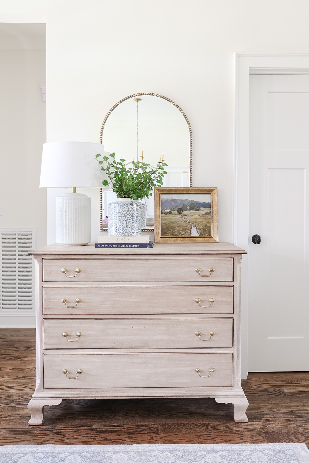 bleached mahogany dresser in entryway