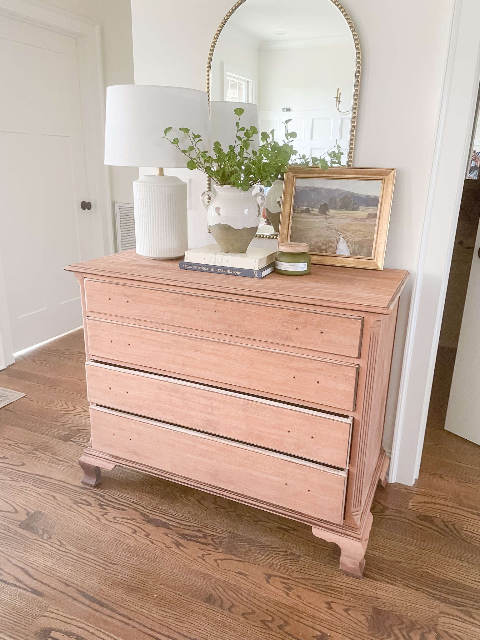 dresser in hallway after being stripped