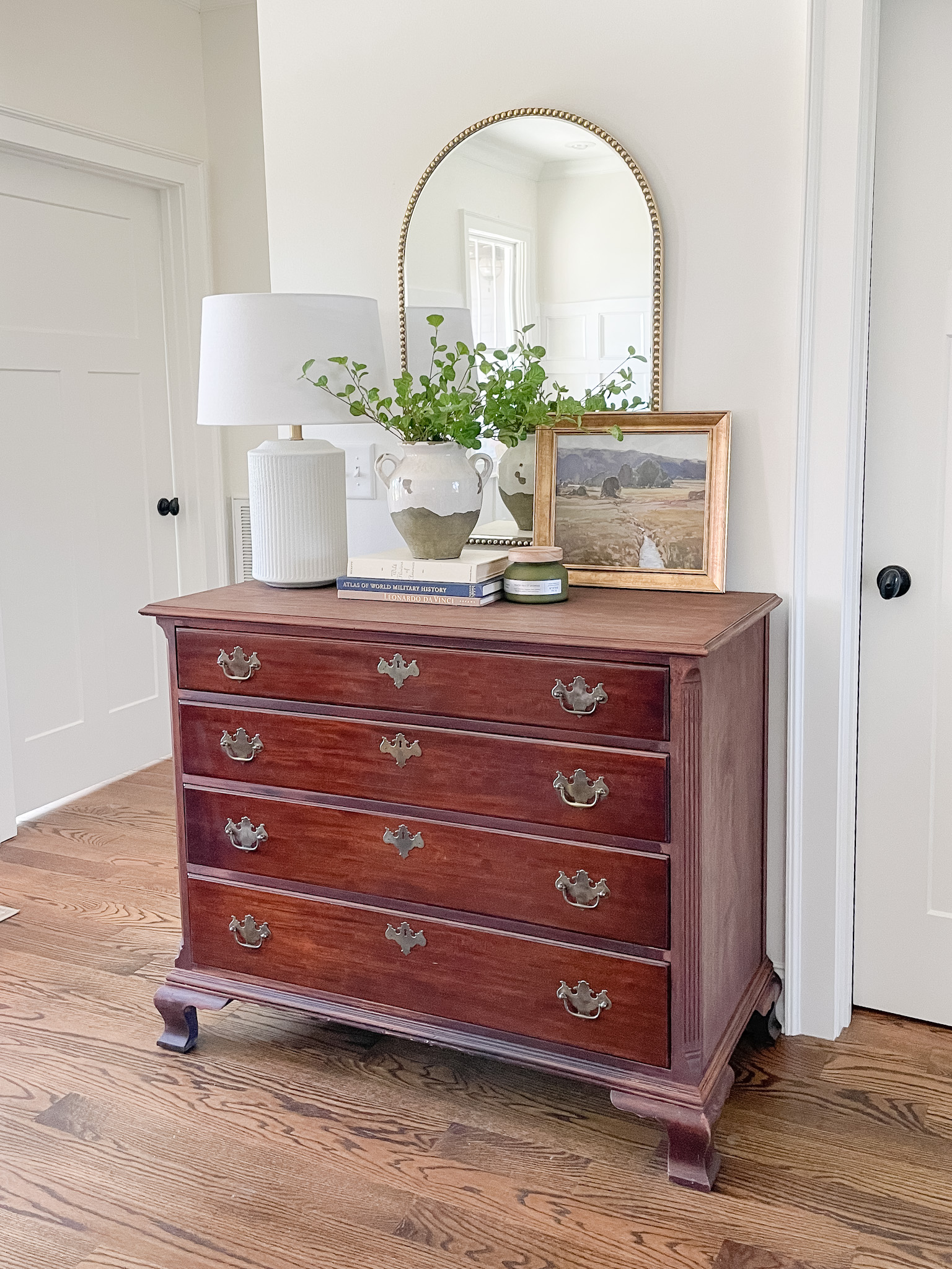 Mahogany dresser with mirror and lamp