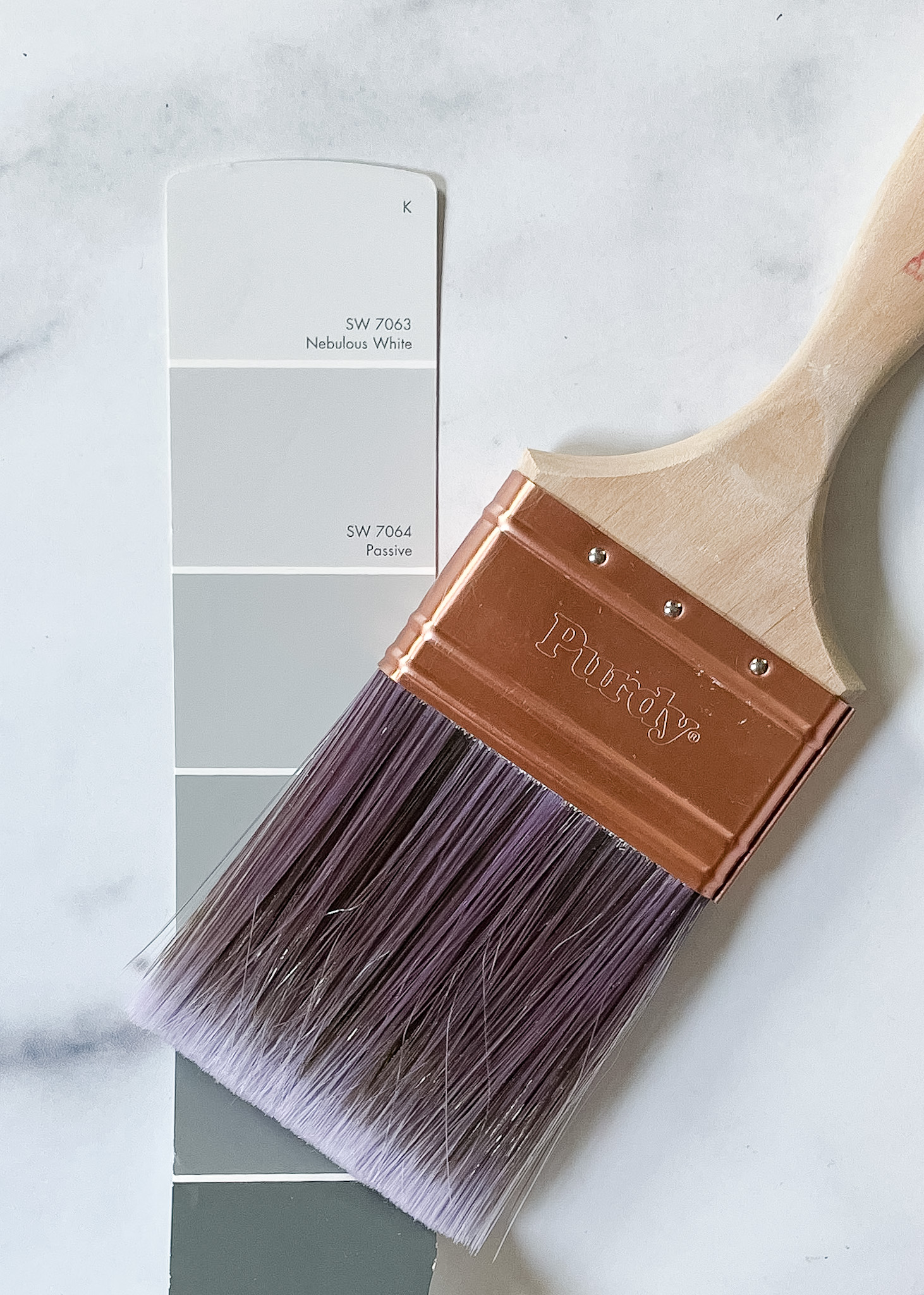 SW nebulous white paint swatch with brush