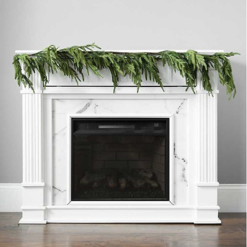 pine garland on fireplace