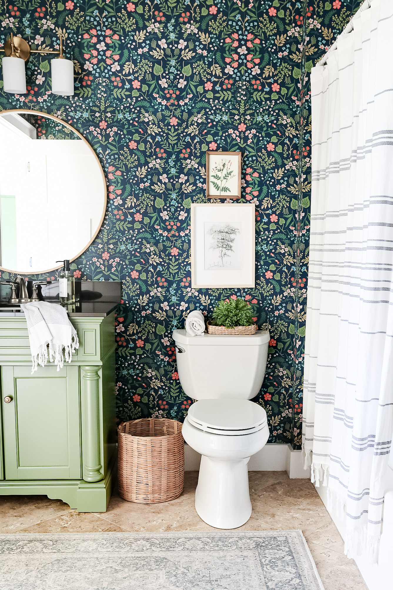 blue floral wallpaper bathroom with green vanity Girl Bathroom Update
