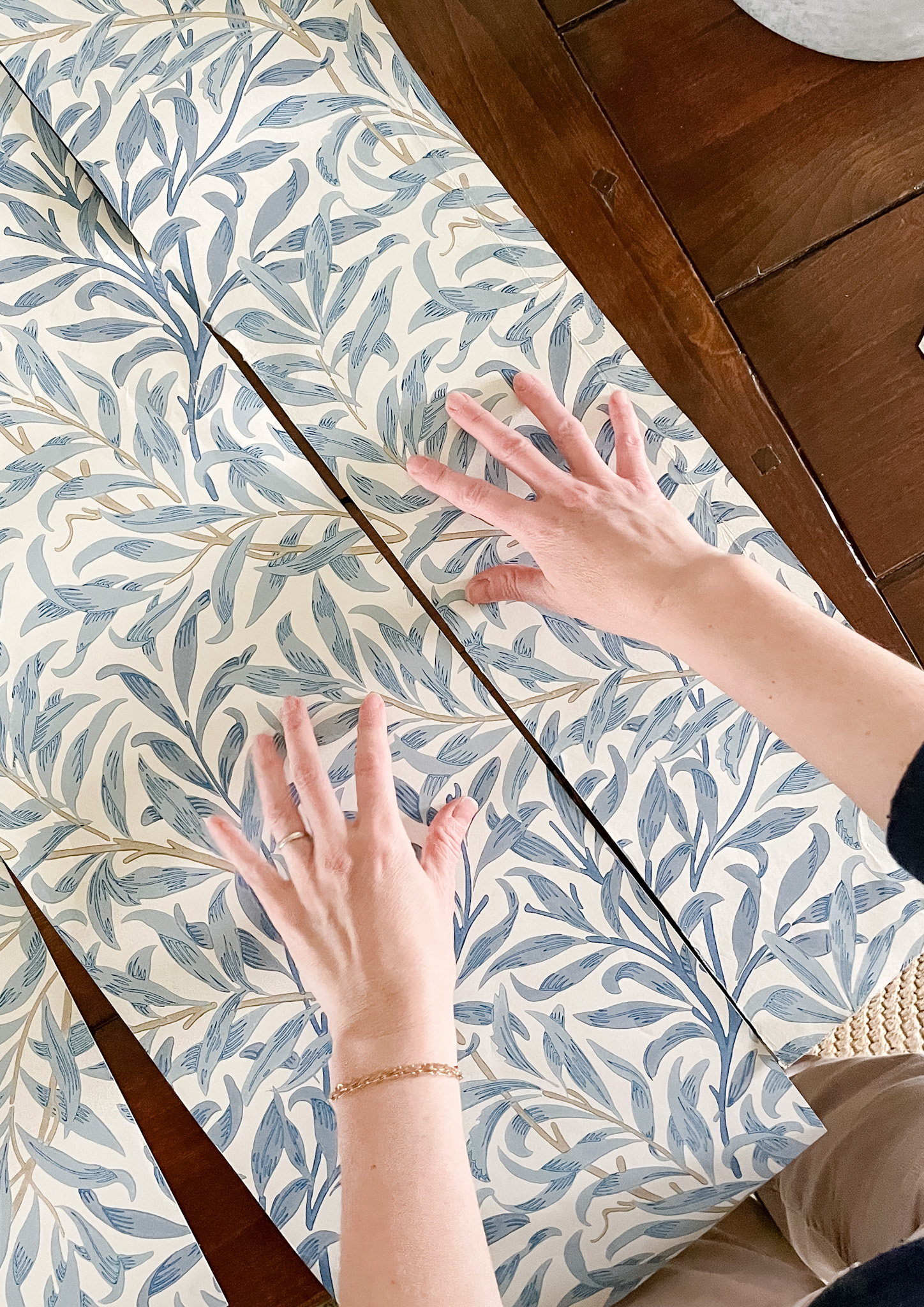 lining the pattern of the wallpaper
