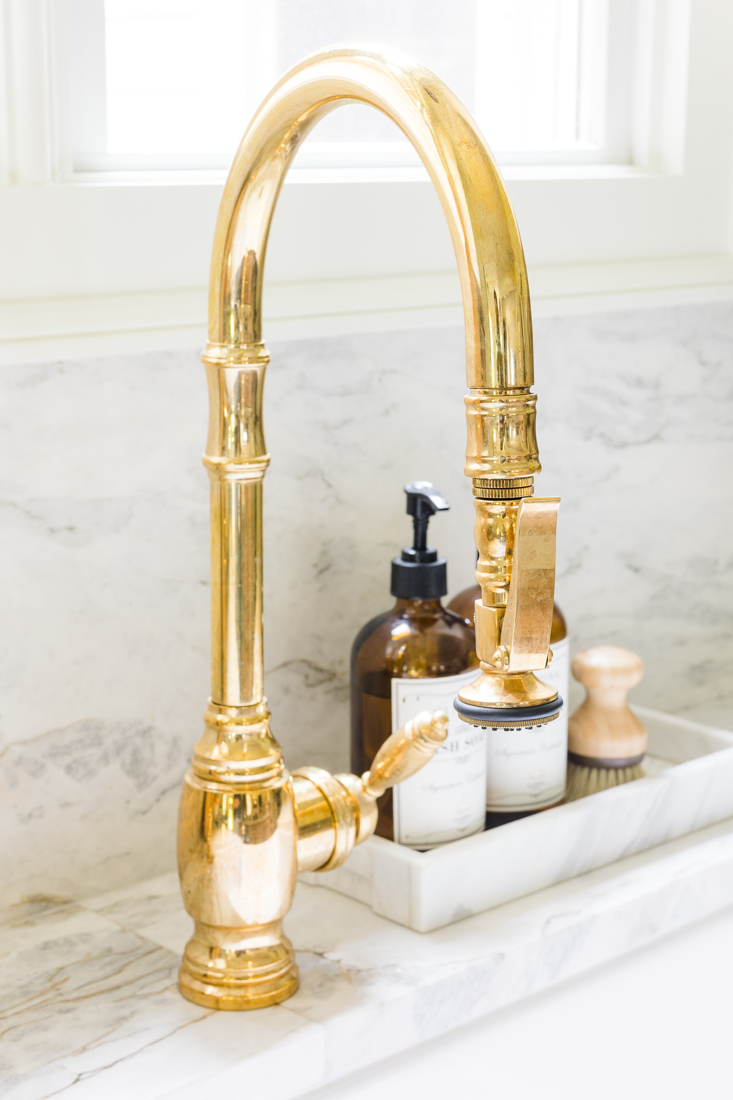 unlacquered brass kitchen faucet