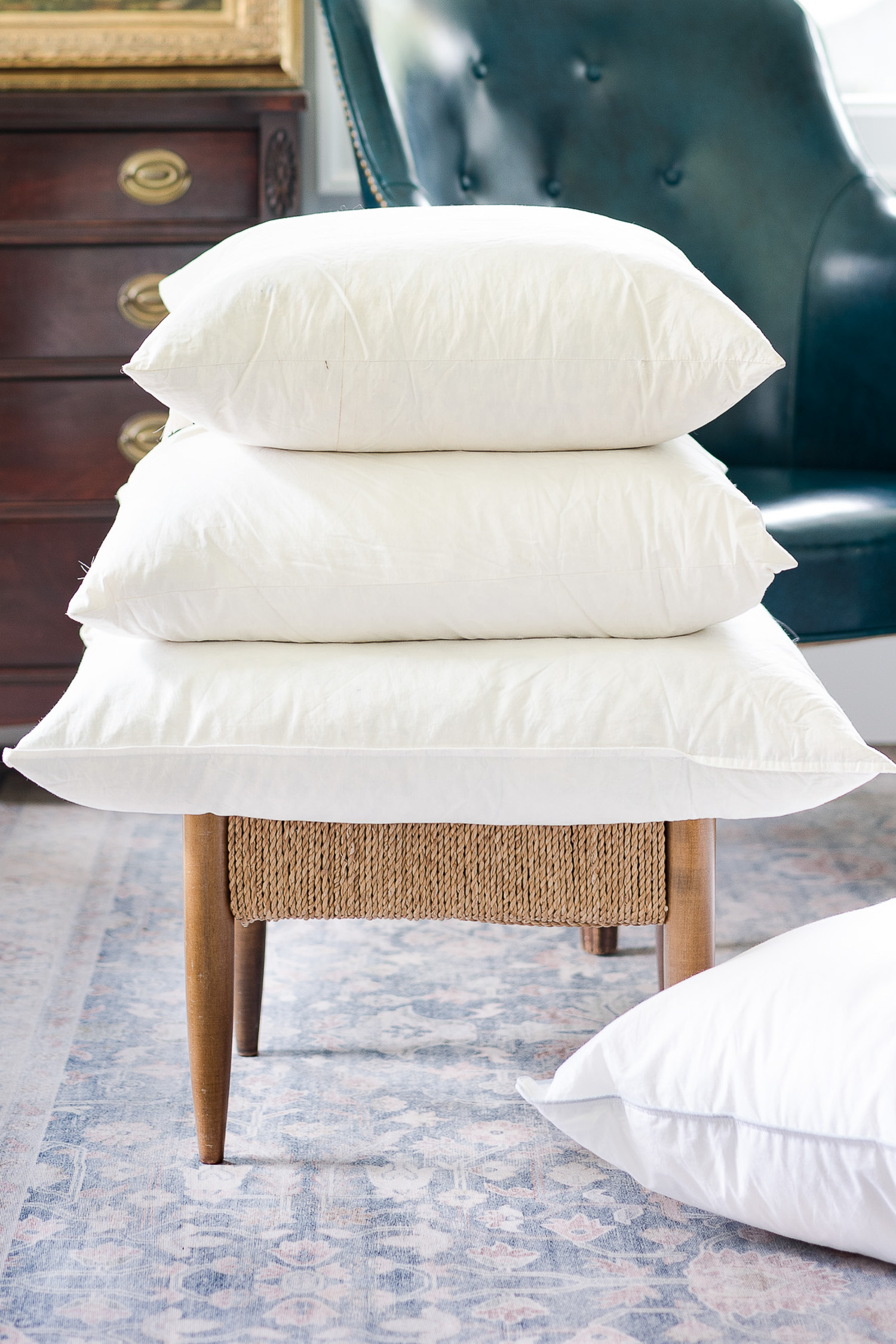 pillow inserts stacked on stool