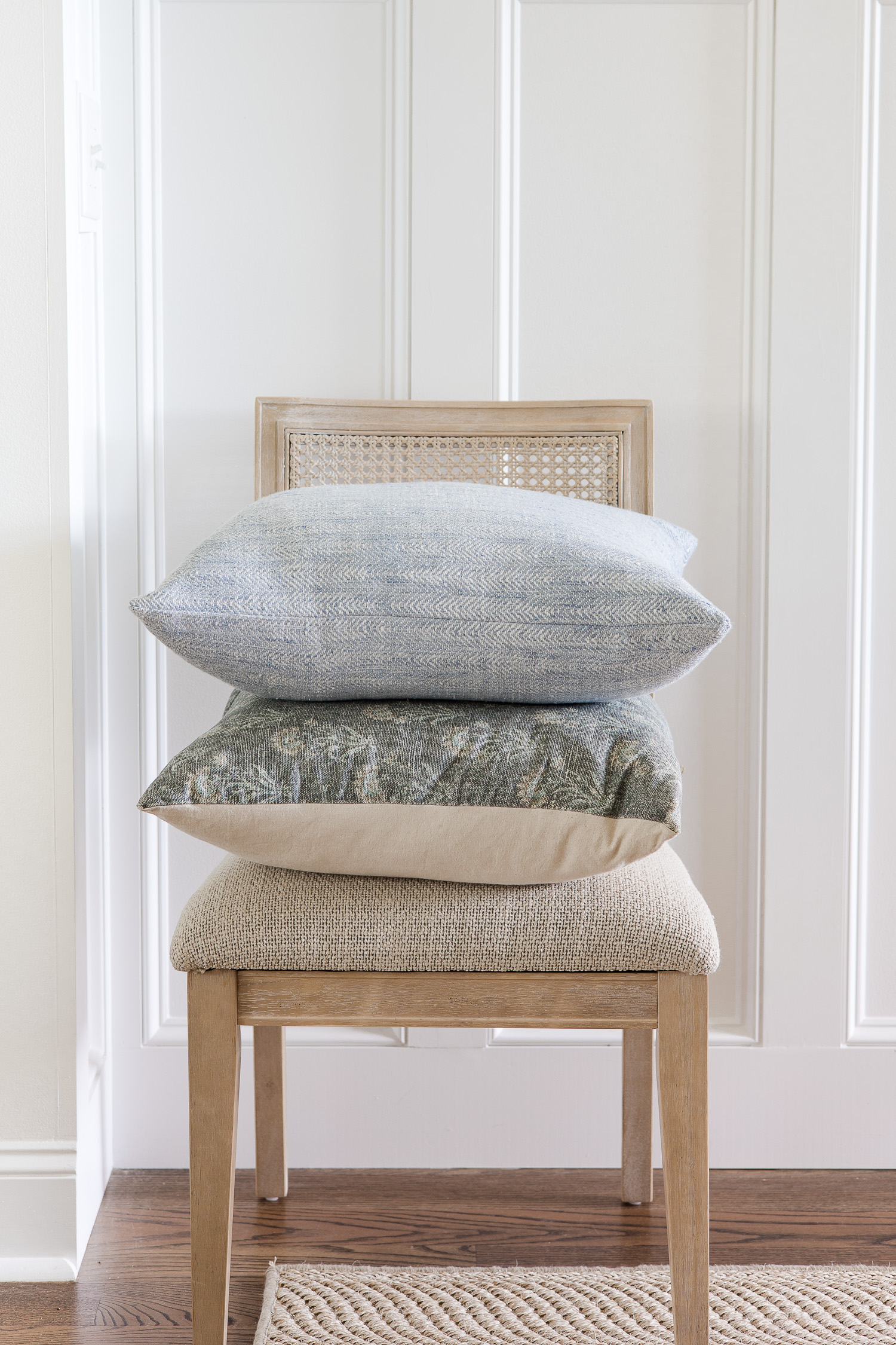two pillows stack on a chair