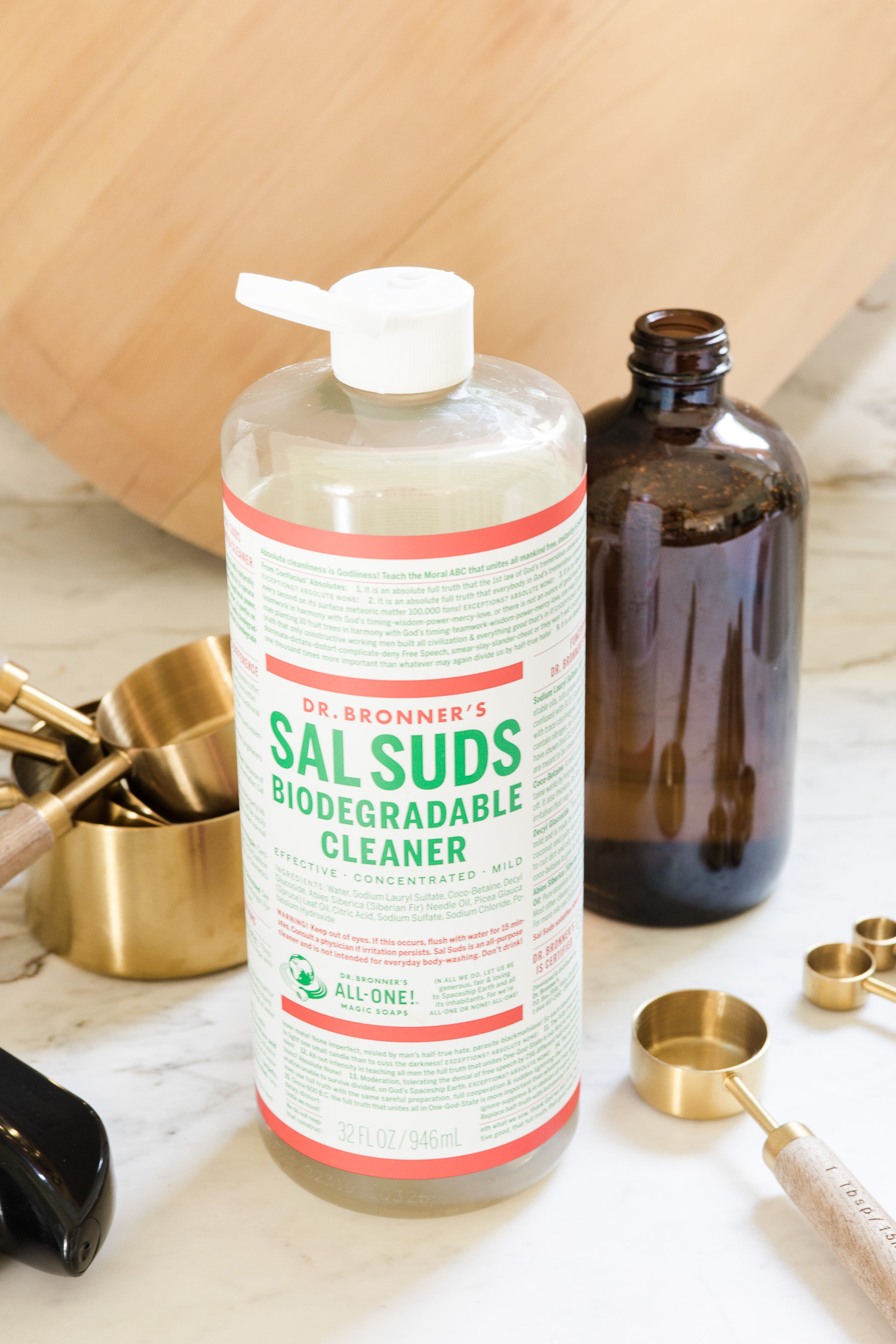 spray bottle and sal suds sitting on counter to make all purpose cleaner