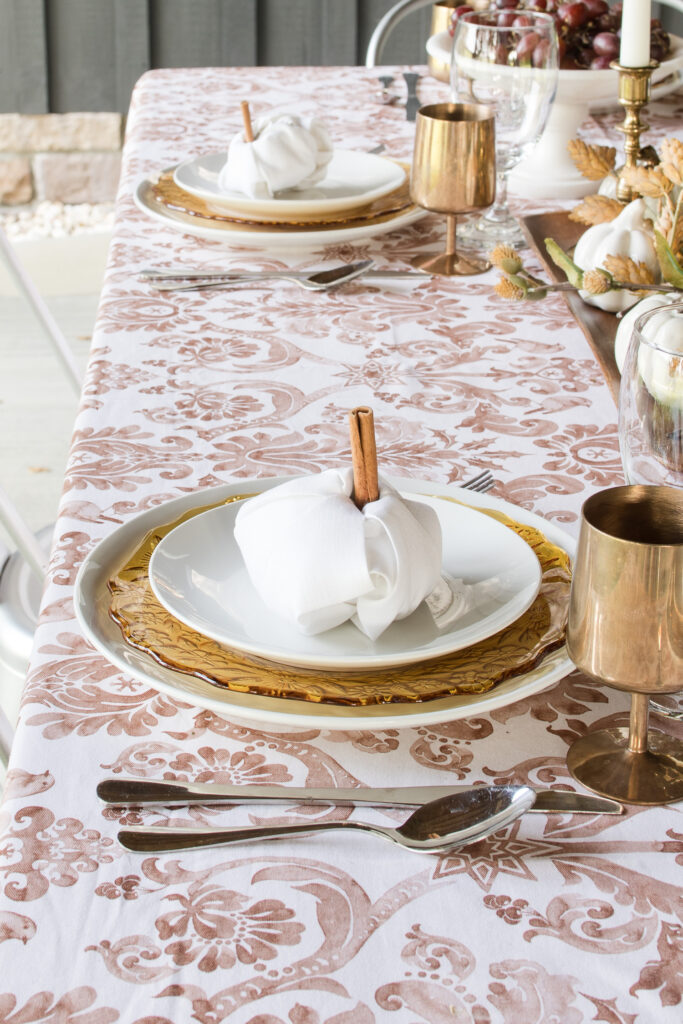 pumpkin napkin fold on dining table setting