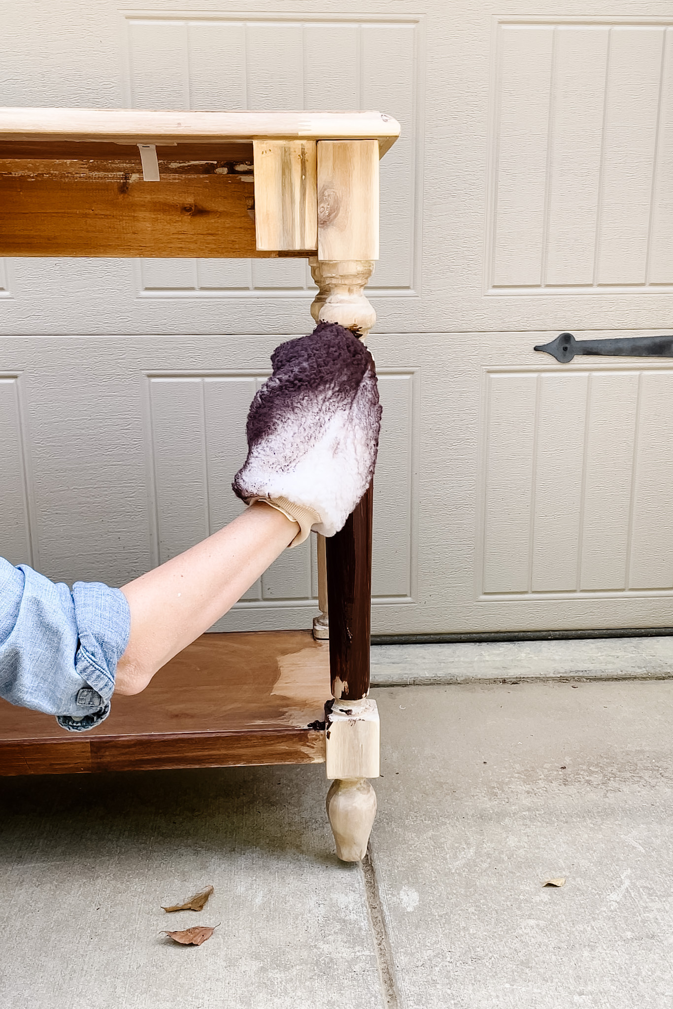 applying stain with a stain mit