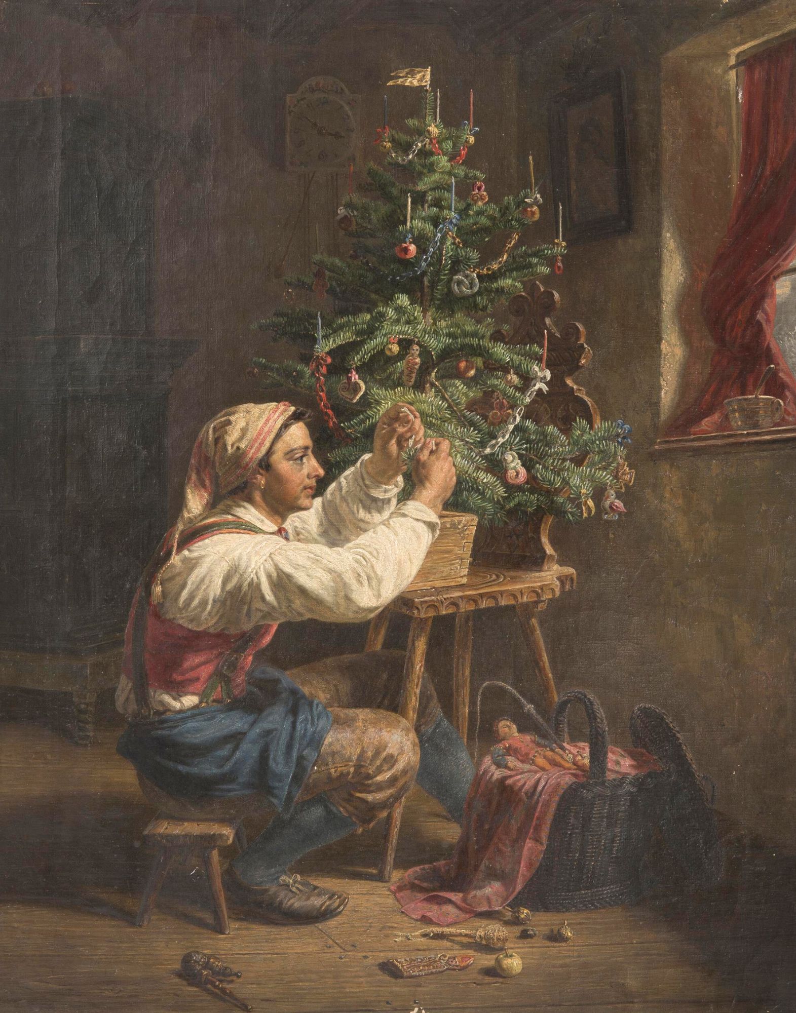 man putting ornaments on christmas tree