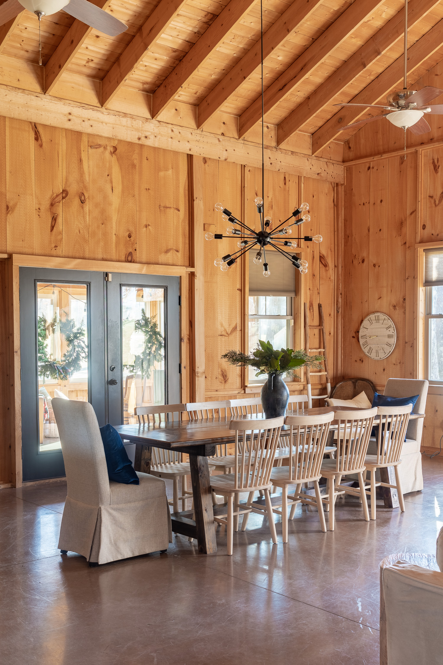 barndominium dining room with table and chairs