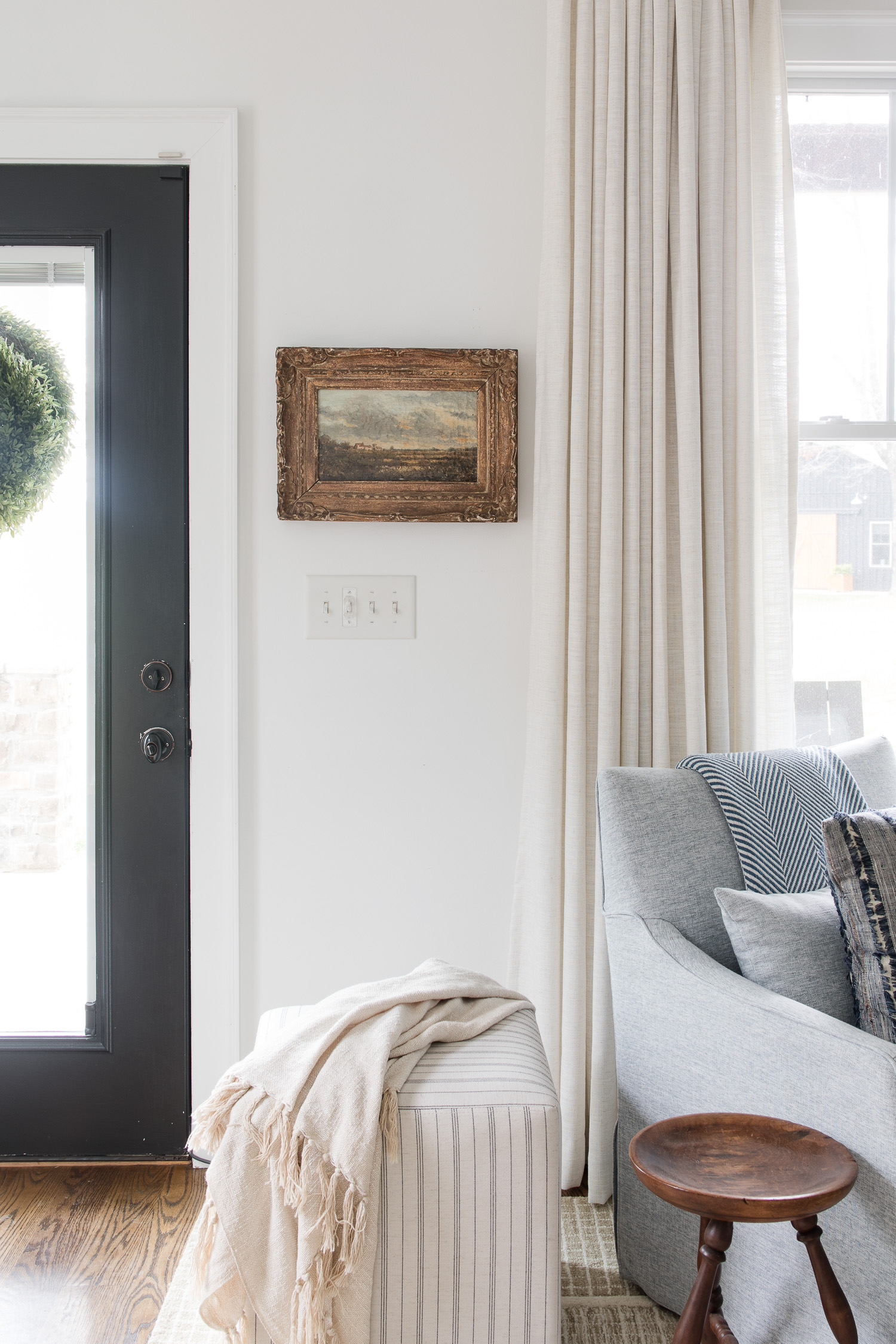 antique art on wall in living room