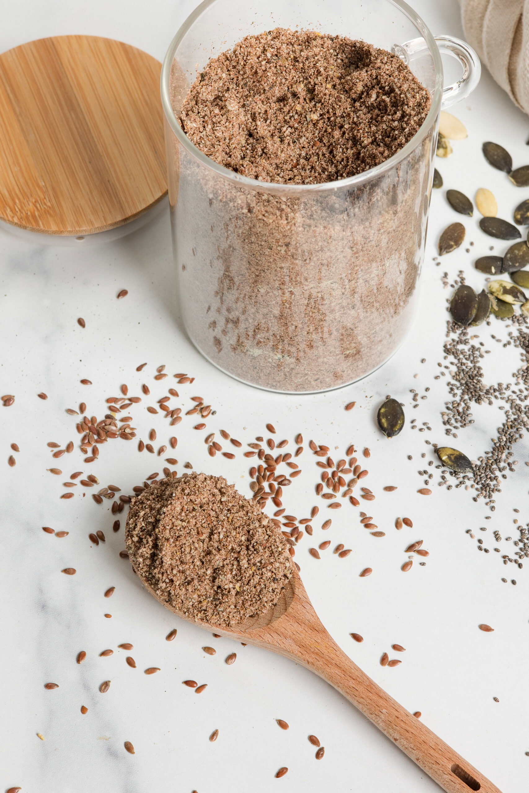 spoon of homemade protein powder with wood spoon