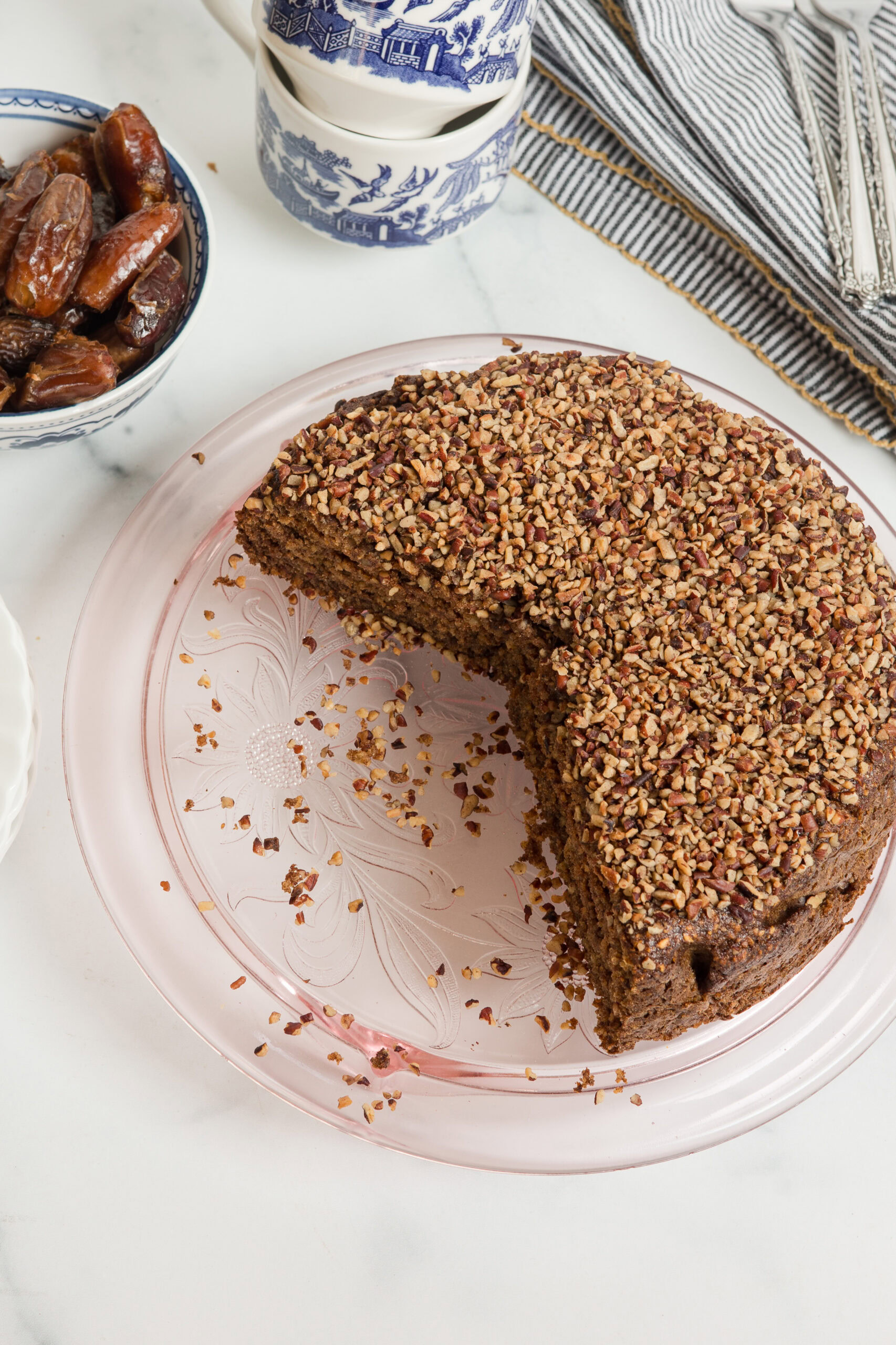 date and almond cake on a serving platter