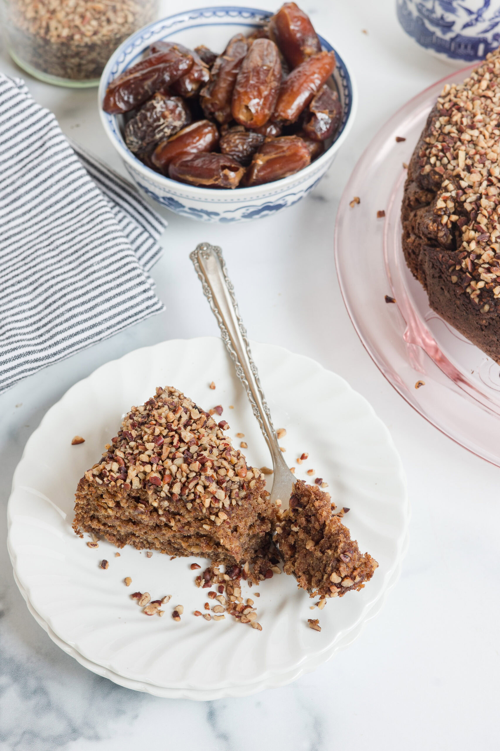 slice of date cake on a plate