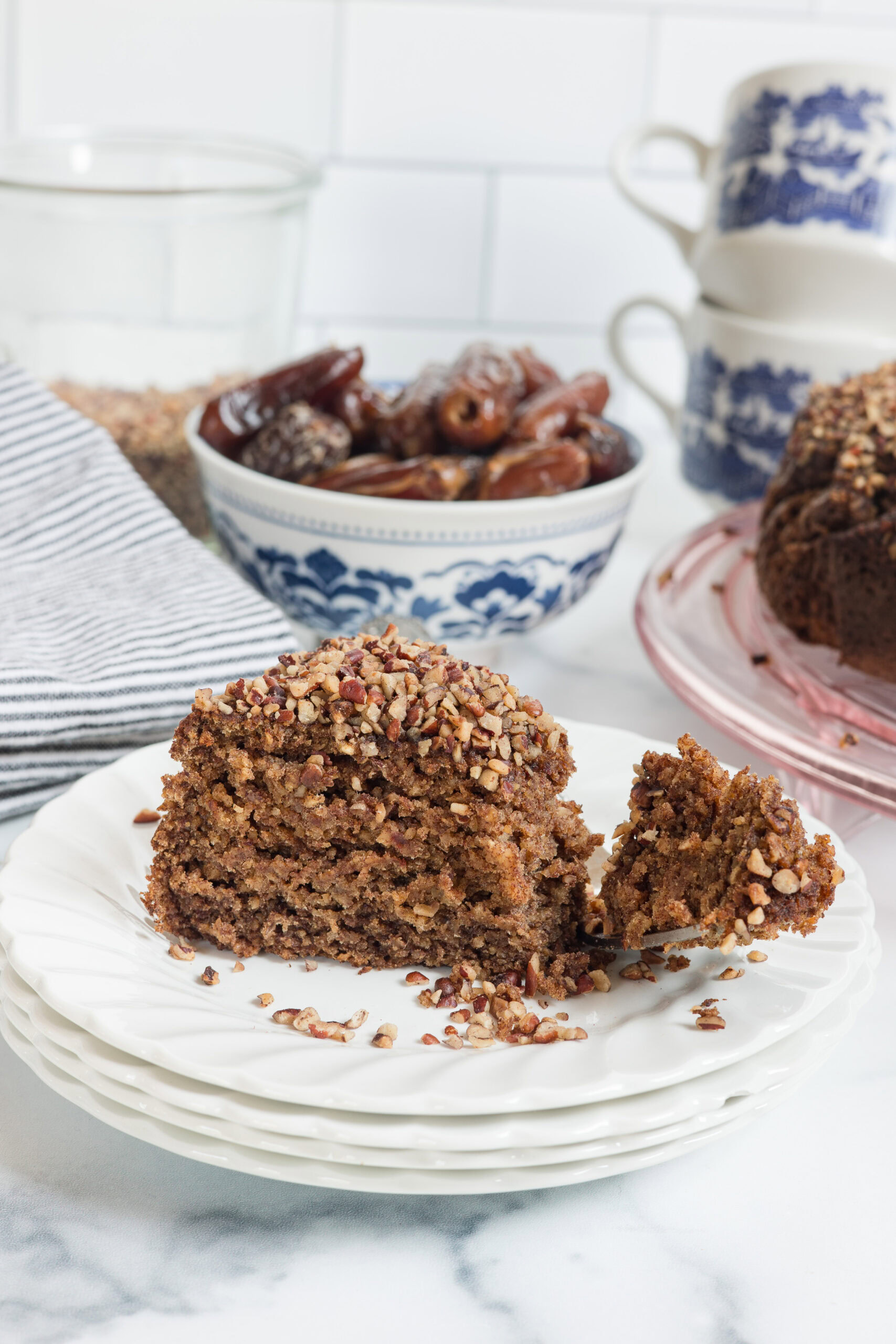 slice of date cake on a plate