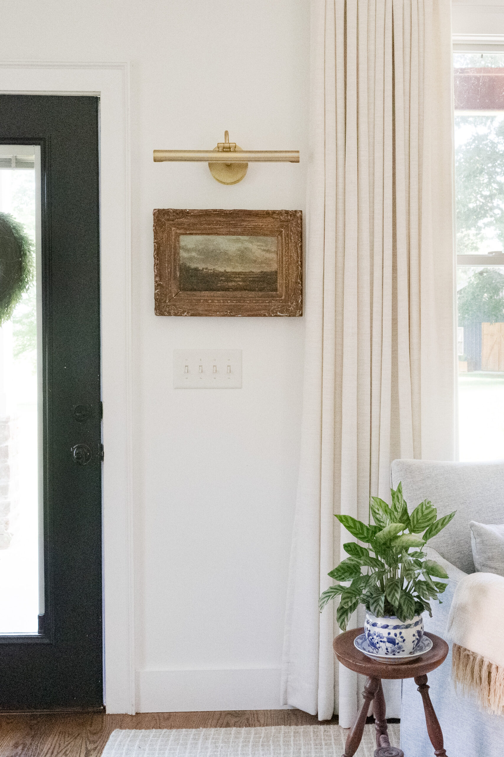 picture light displayed above painting