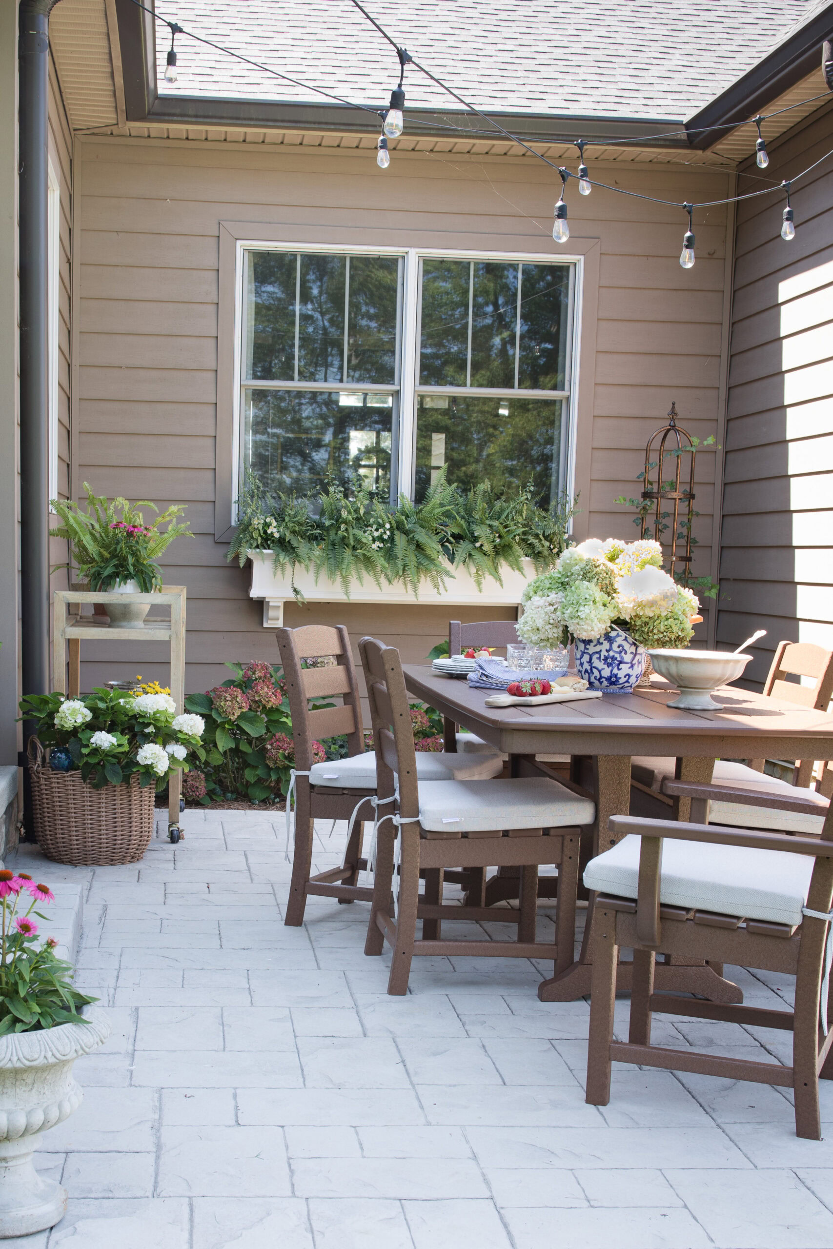 dining table on back patio with fall decor