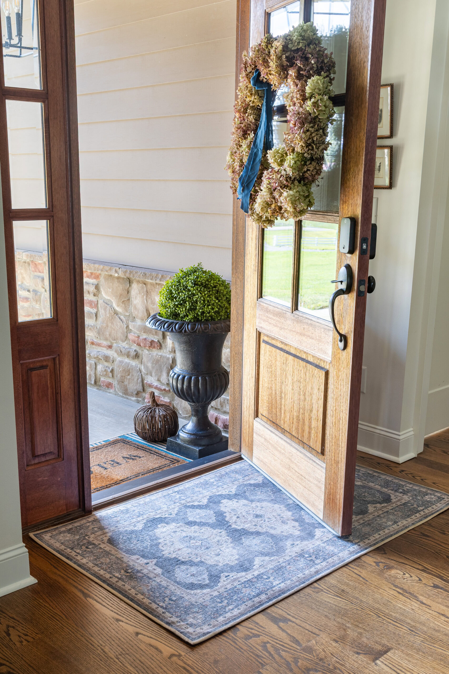 blue washable rug at front door